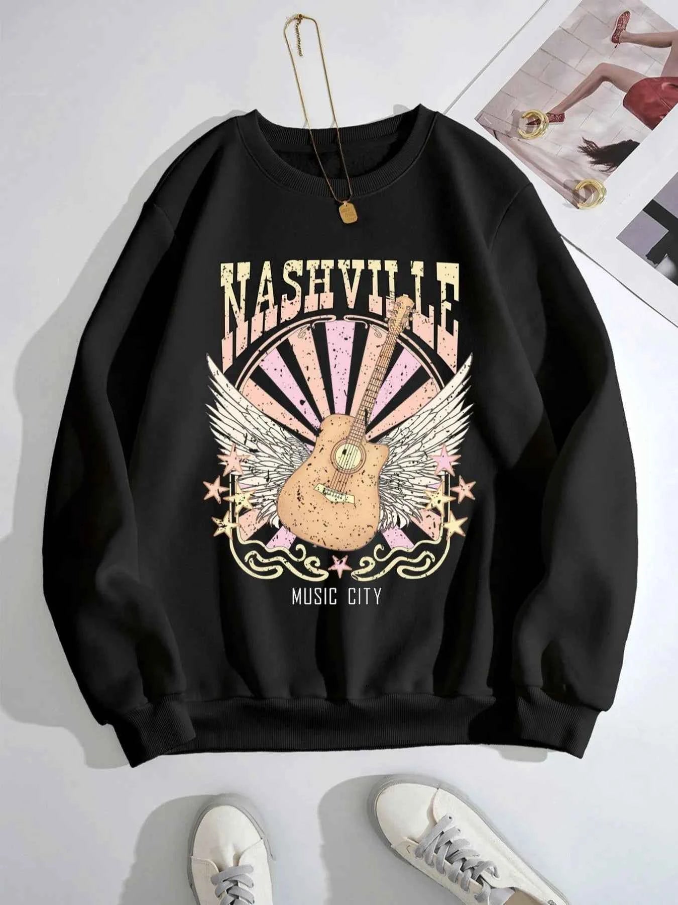 Graphic Round Neck Long Sleeve Sweatshirt Black 0f07b2e6-ac9f-466a-bb80-91abc1b5ec6a-Max-Origin