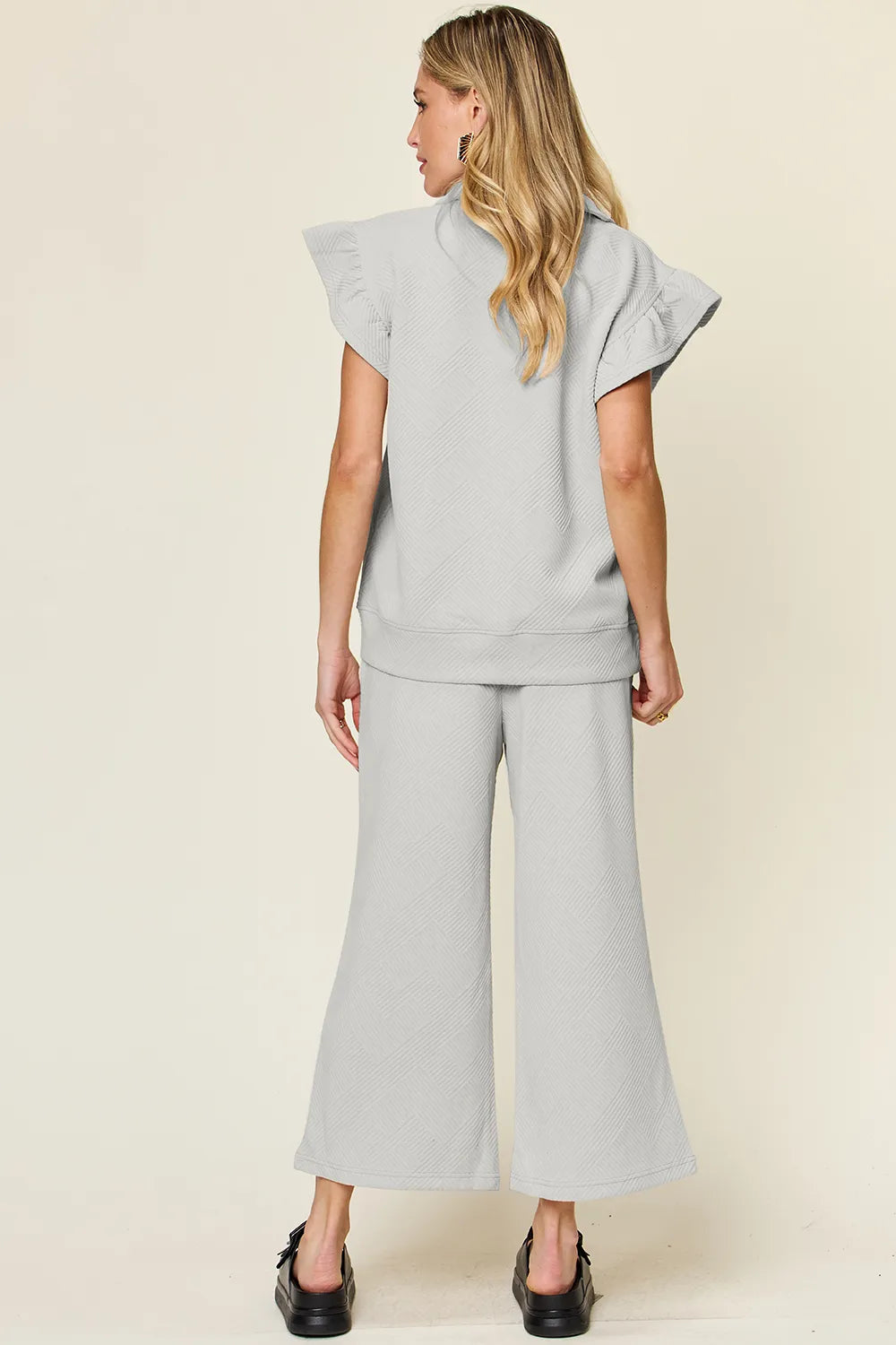Double Take Texture Ruffle Short Sleeve Top and Drawstring Wide Leg Pants Set 11ba816d-5c55-48f6-a1c8-ed709fe91cb4-Max