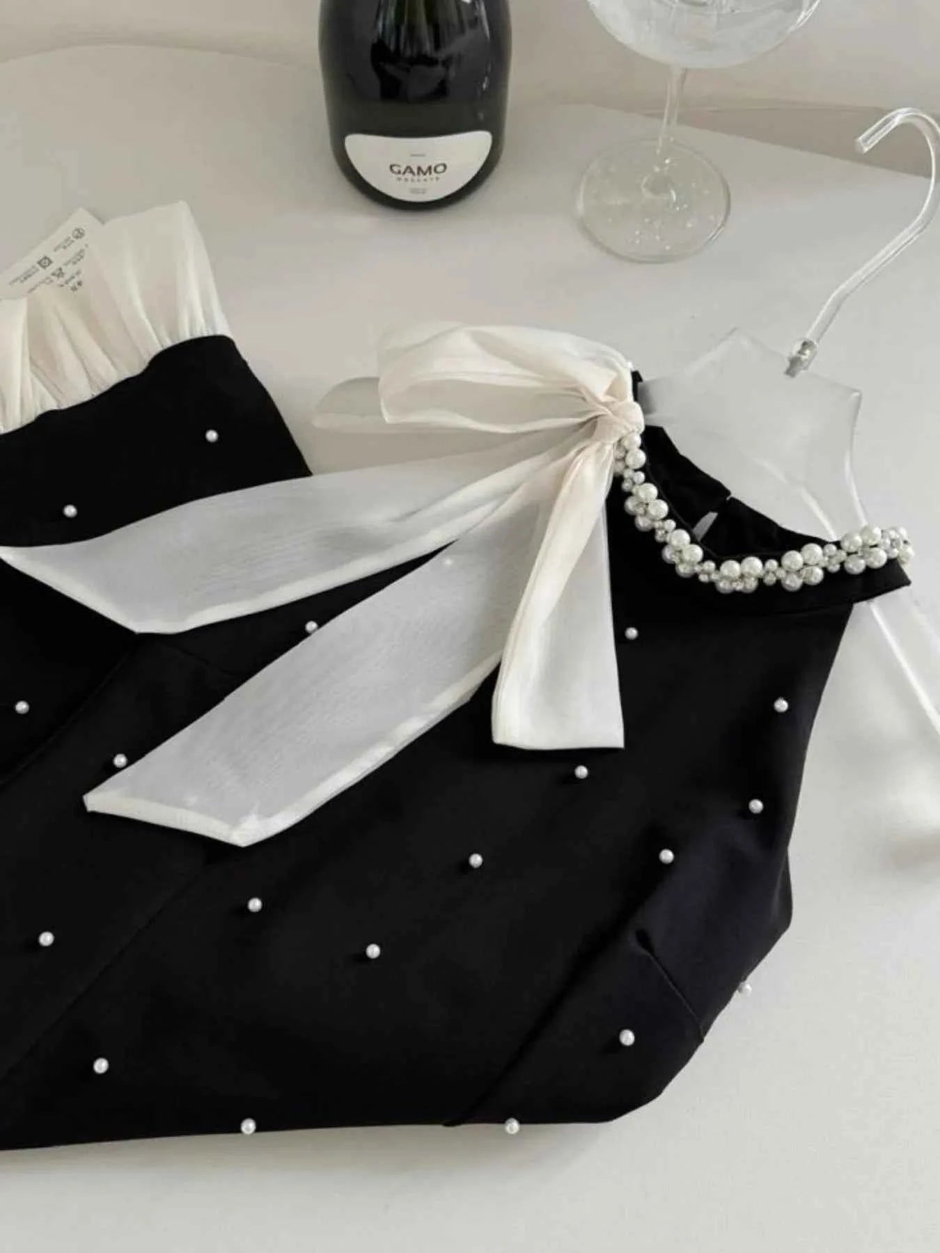 Pearl Detail Sleeveless Mini Dress 1708d8a8-0e4f-4ddc-9370-d8f091e35b30-Max-Origin