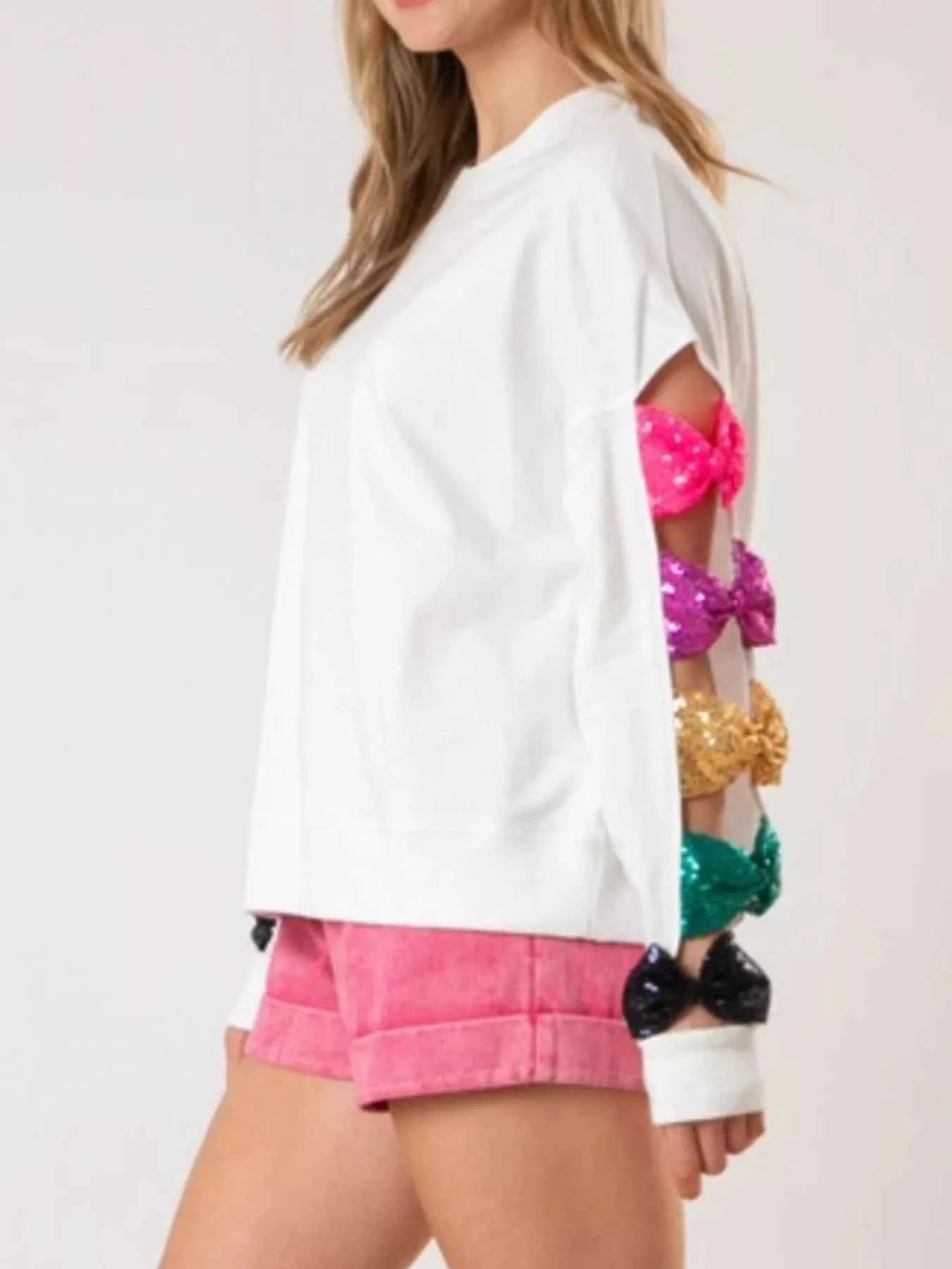 Sequin Bow Cutout Round Neck Sweatshirt 1e0449d7-5c89-4d4c-bff7-550dd7e2083e-Max-Origin
