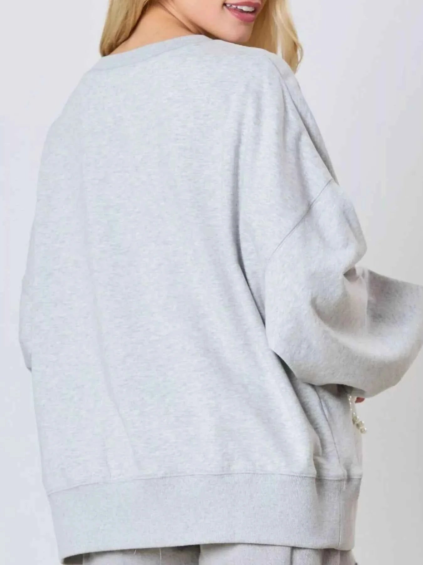 Pearl Embellished Bow Long Sleeve Sweatshirt 291e5a22-e4b3-4bc6-b0ed-d5dbb56ca26d-Max-Origin