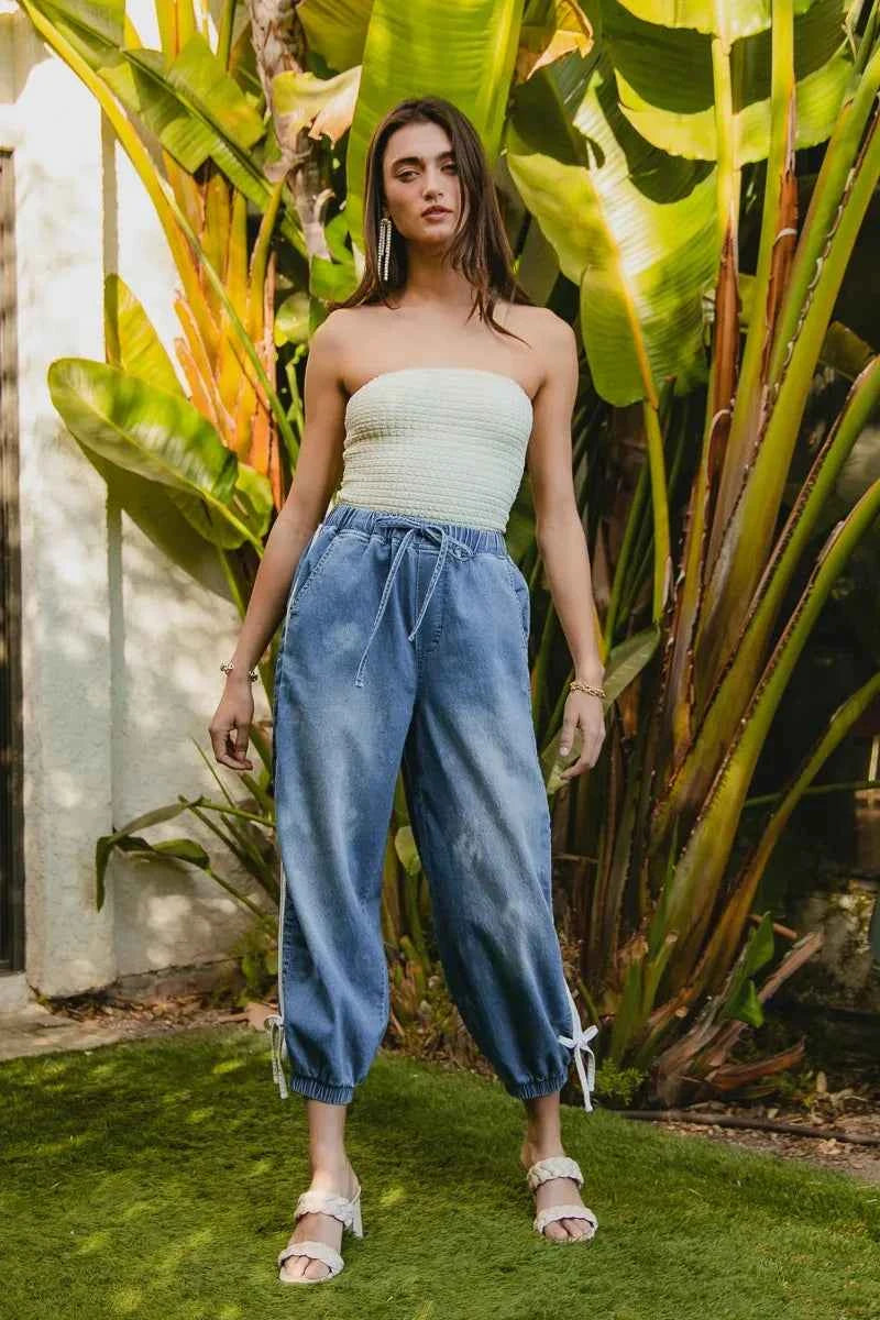 BiBi Striped Tape Details With Bot Tied Point Elastic Waist Jeans 83bb78783fbd4020b57cd0775bb667f5-Max-Origin