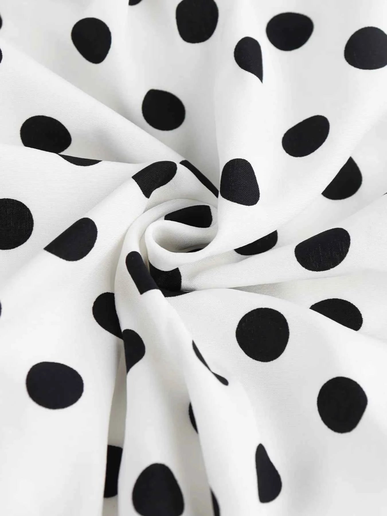 Polka Dot Halter Neck Mini Dress 844222a4-1705-4241-b6ad-cd94d52092dc-Max-Origin