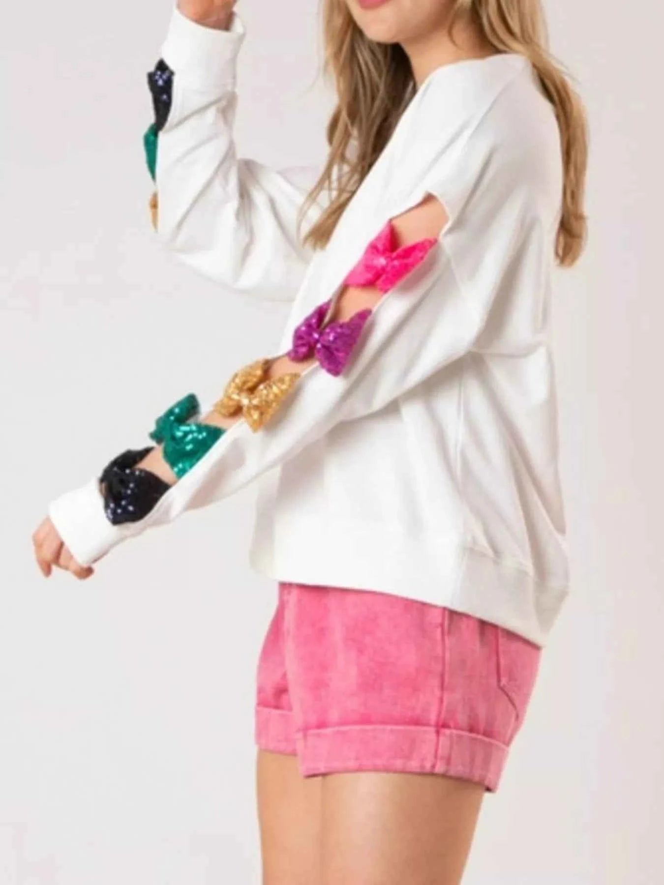 Sequin Bow Cutout Round Neck Sweatshirt 90ebe0ca-6375-4fe8-94b5-206effcabc8c-Max-Origin