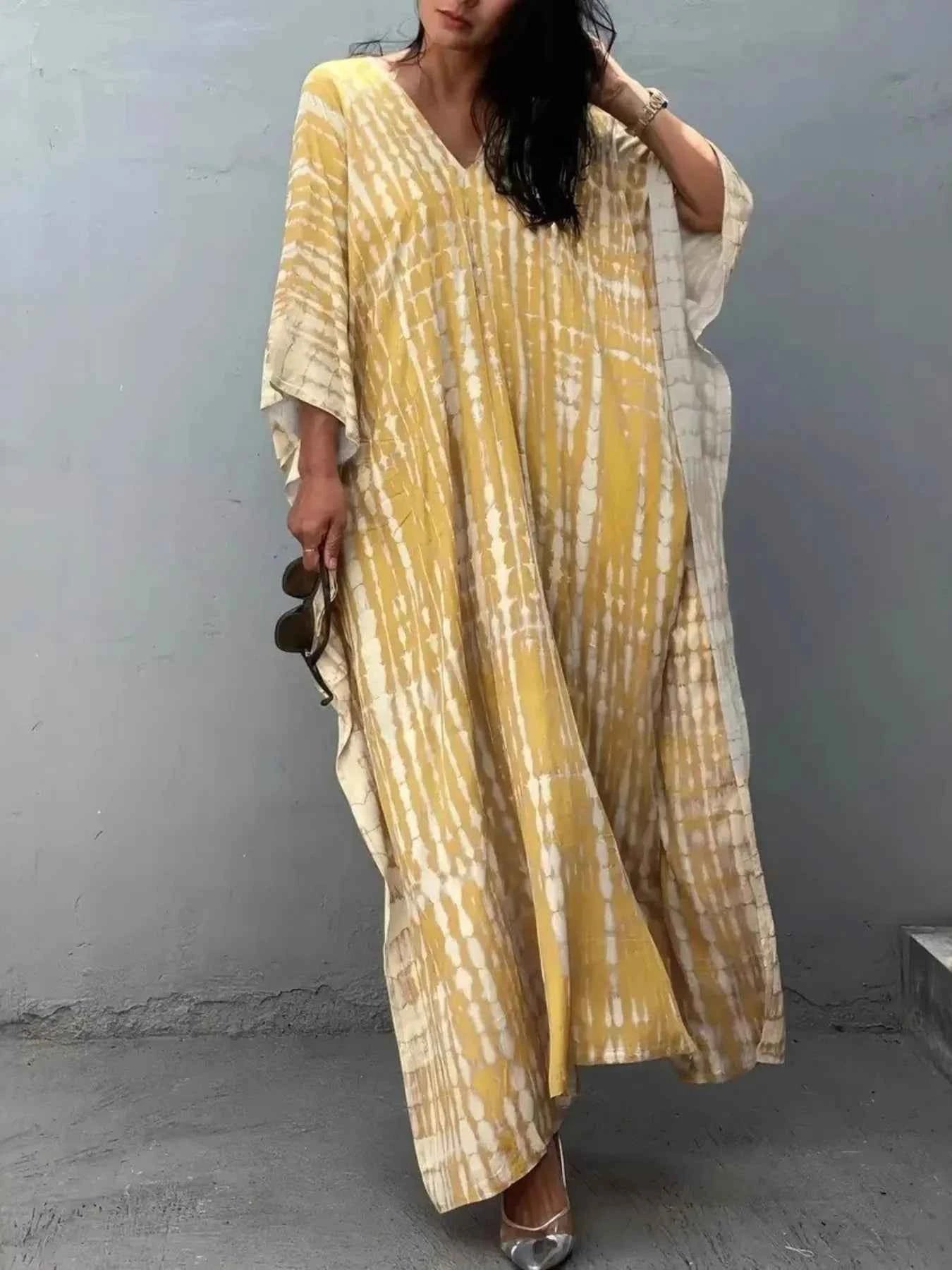 Tie-Dye V-Neck Maxi Dress with Flowy Sleeves 91b57cf696cf4223bbc8183d0a3c5aed-Max-Origin