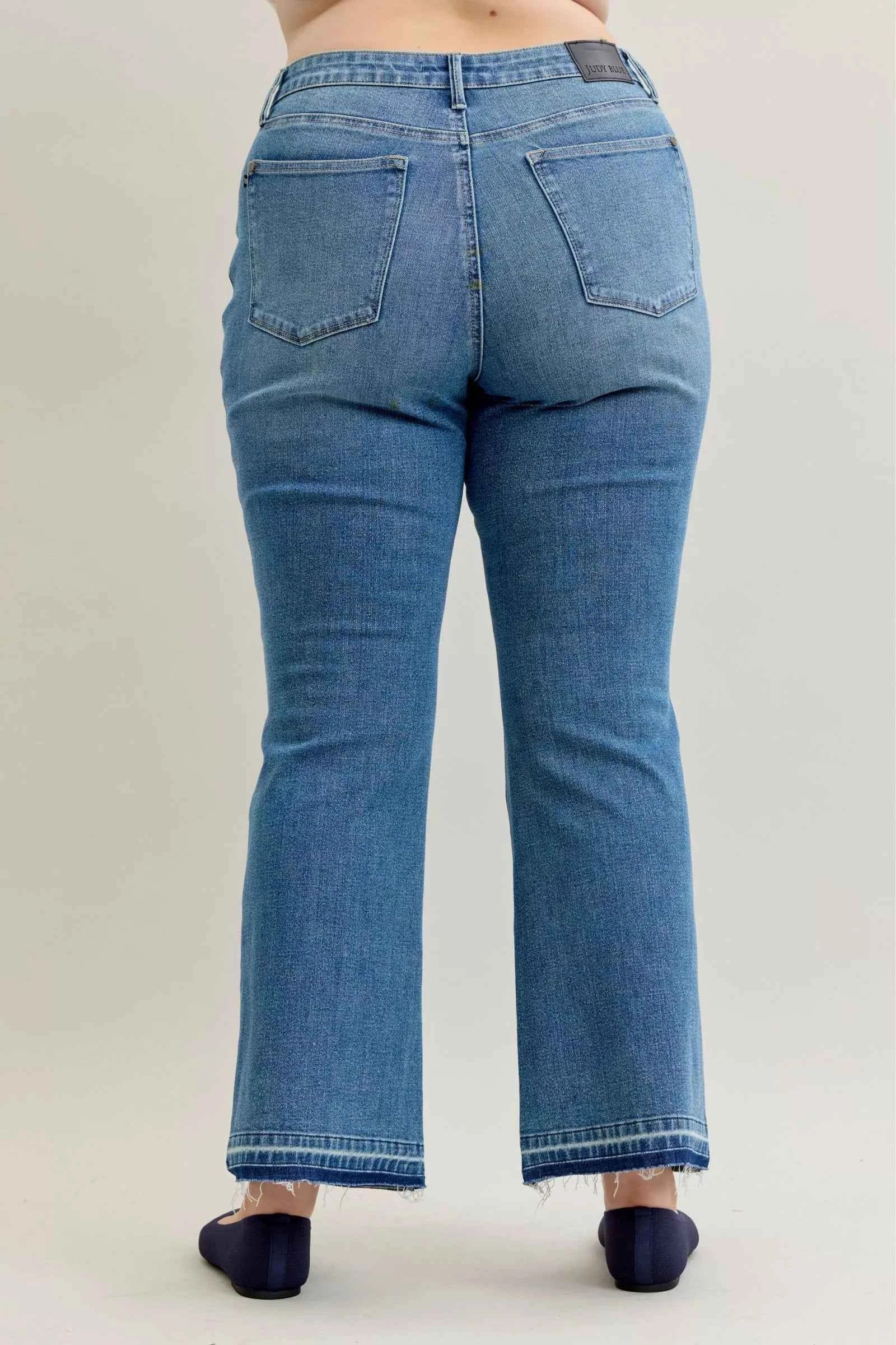Judy Blue Full Size Mid Rise Slim Bootcut Tummy Control Release Hem Jeans Plus Size a5737d2a-2c2d-40f9-9ab5-9324fbc55296-Max-Origin