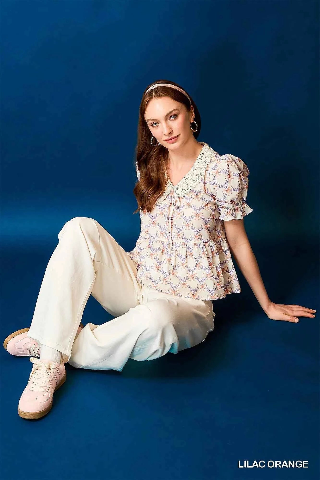 Umgee Lace Detail Bow Print Flounce Sleeve Blouse aae36ae3-4ee2-4841-8992-913505ccf340-Max-Origin