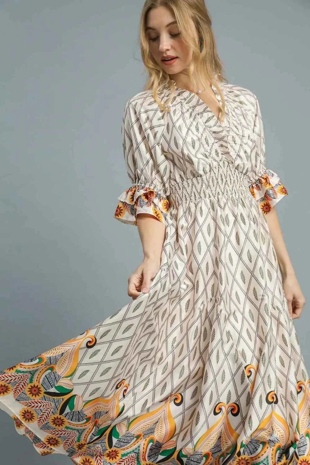 Umgee Printed Smocked Waist Flounce Sleeve Midi Dress ae6e49dd-be4a-4b36-bc73-049c361d4811-Max-Origin