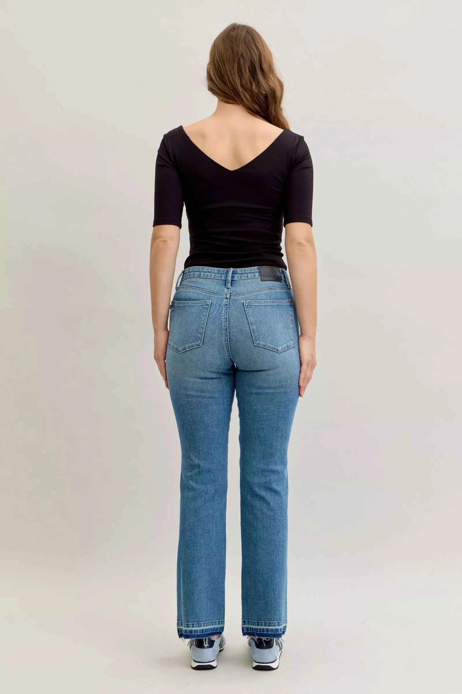 Judy Blue Full Size Mid Rise Slim Bootcut Tummy Control Release Hem Jeans Plus Size cdcb5fe0-2b58-4974-ab7d-10cf9041f5df-Max-Origin