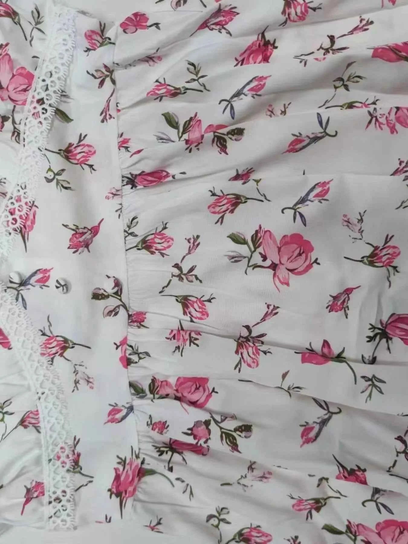 Full Size Floral V-Neck Long Sleeve Mini Dress Plus Size d420da26-1e99-4aed-ba25-9070ab6d3ffc-Max-Origin