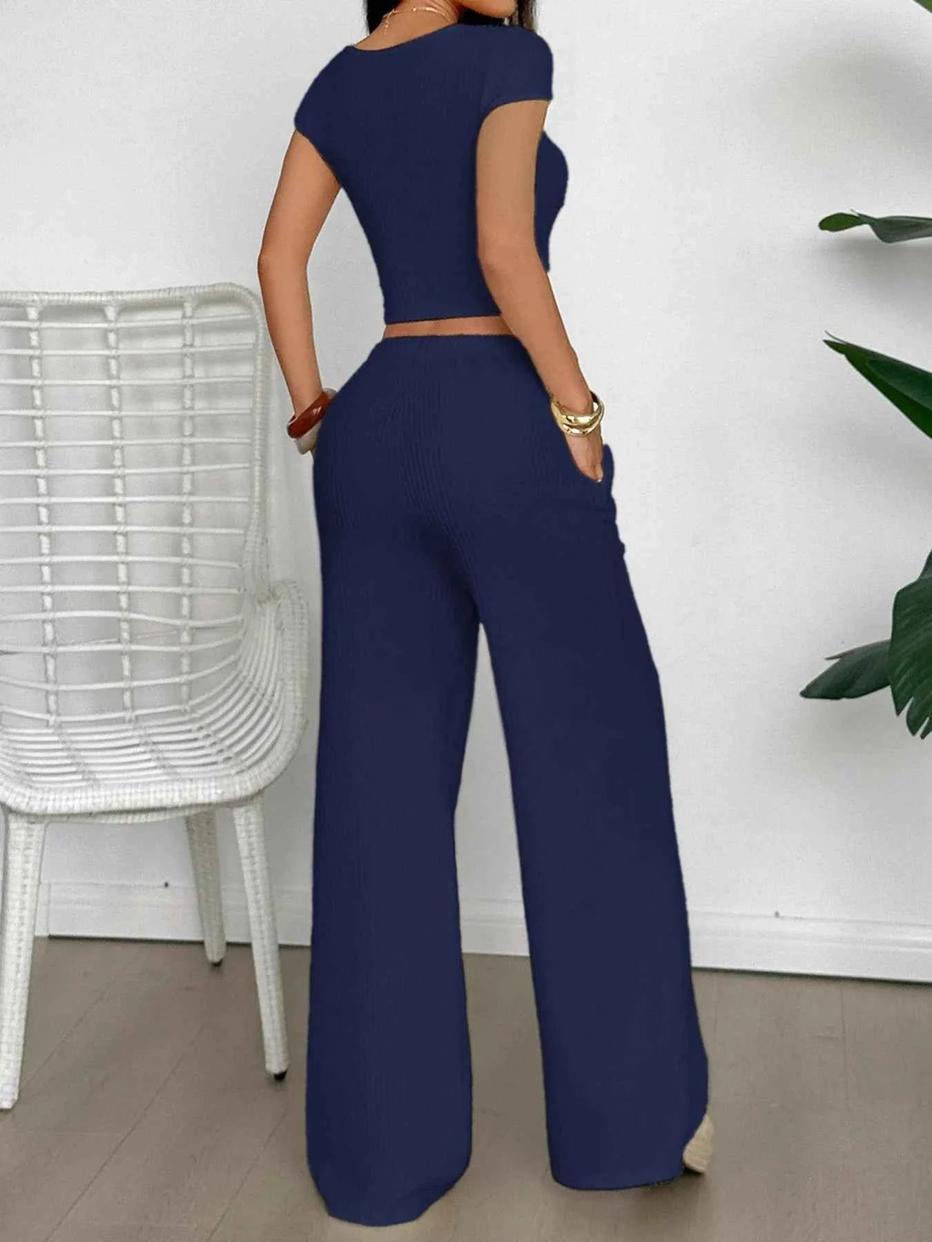 Cutout Short Sleeve Top and Pants Set d7bc60ae04ee40f49fa58a8d66d1a92f-Max-Origin