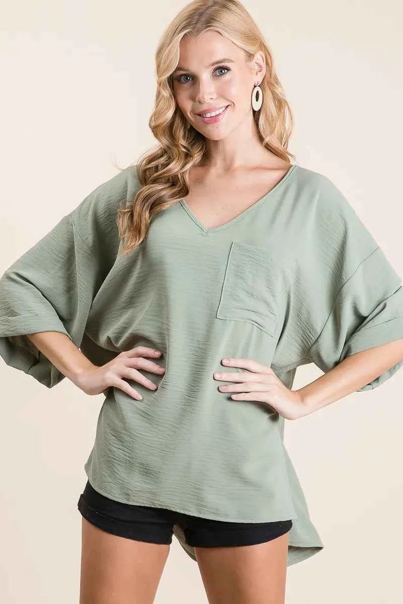 BiBi Flowy Woven V-Neck Top with Rolled Up Cuffs df77dcd1b06d4f10bb5bc911264be94a-Max-Origin