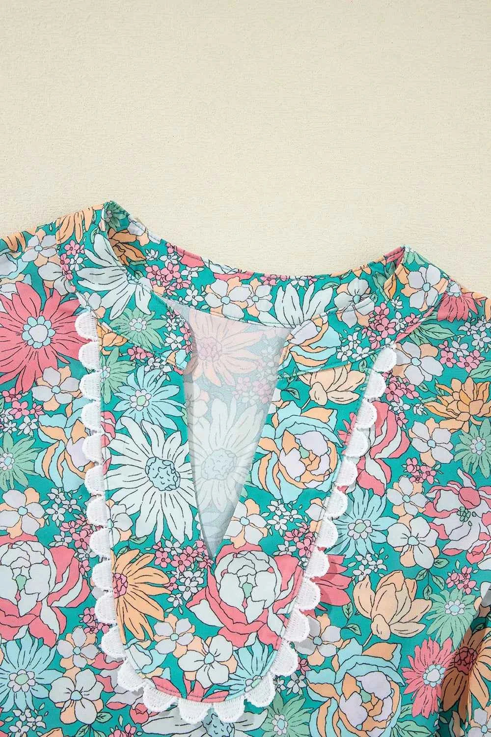 Printed Notched Short Sleeve Blouse 00357a62-1030-42cf-89ee-c1336ce409f0-Max