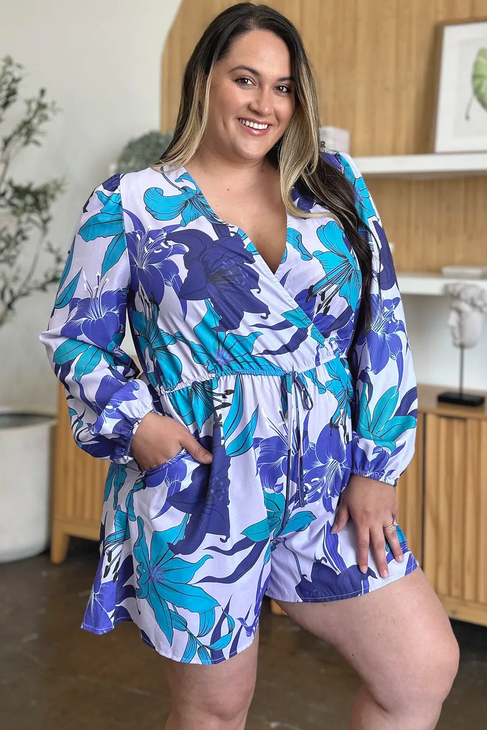 Double Take Full Size Floral Long Sleeve Romper with Pockets 1ccb4a67-153a-4ca7-a704-fce1f25f4f9f-Max