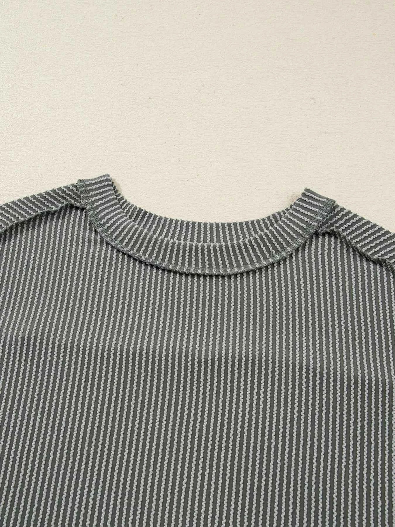 Twist Ribbed Exposed Seam Detail Long Sleeve Loose Top 1e72b0713e394bf283964cbece345e46-Max-Origin