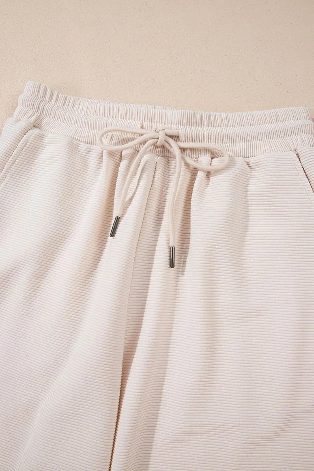 Textured Ruffled Sleeve Zipped Top and Wide Leg Pants Set 21c3c942-3ee2-45f9-8e26-421090cb19ef-Max-Origin