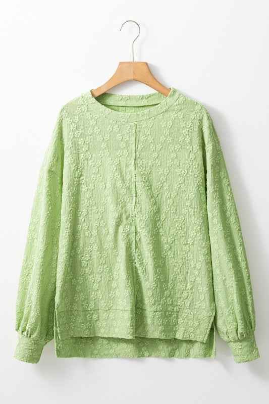 Solid Color Textured Side Split Crew Neck Blouse 24264704_9555fab4-4fd9-4bf1-aca6-90f21a4fc62d