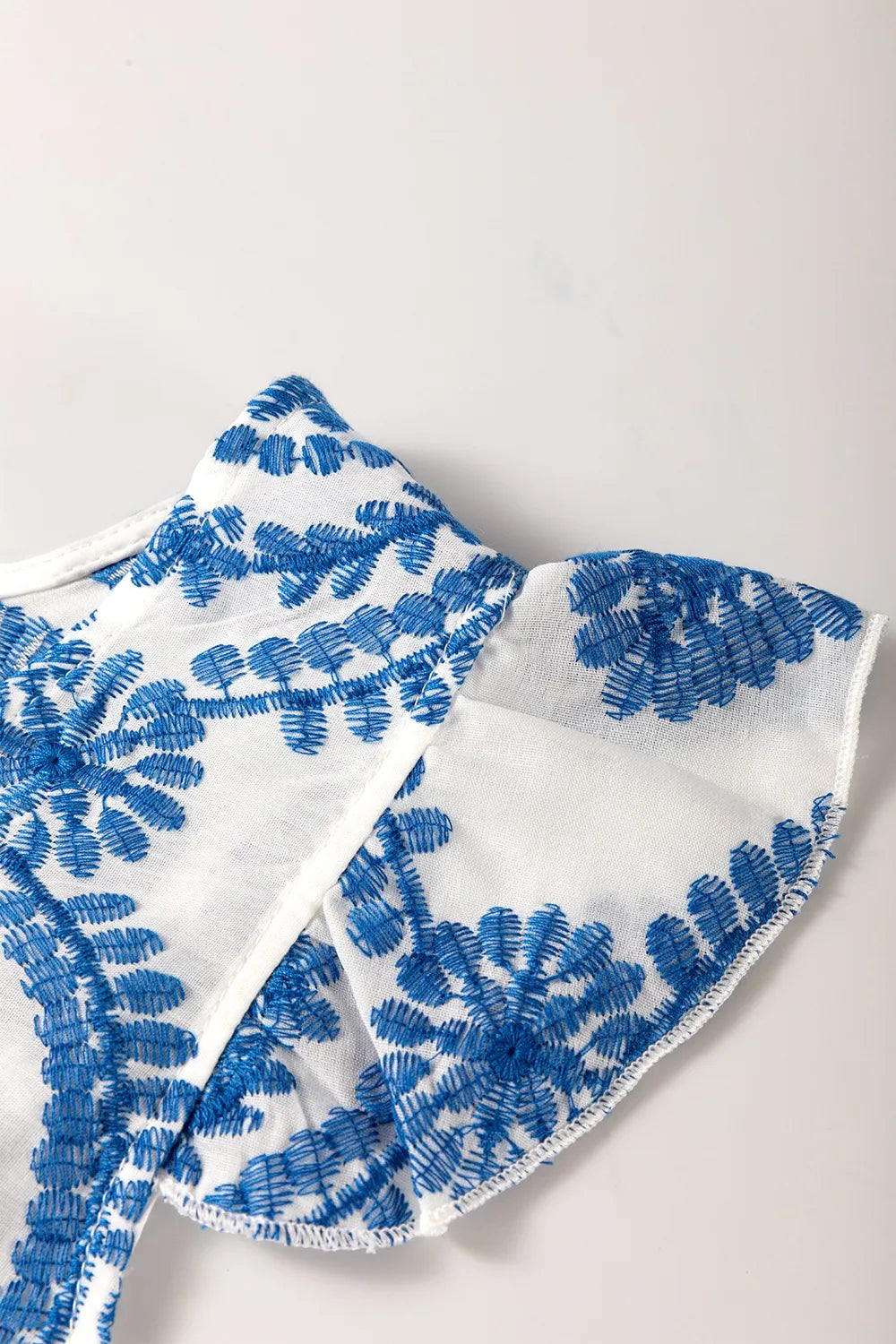 Boho Print Ruffled Cap Sleeve Crew Neck Blouse 295cce08-736f-4e7e-91d2-4cb5ce01f87a-Max-Origin