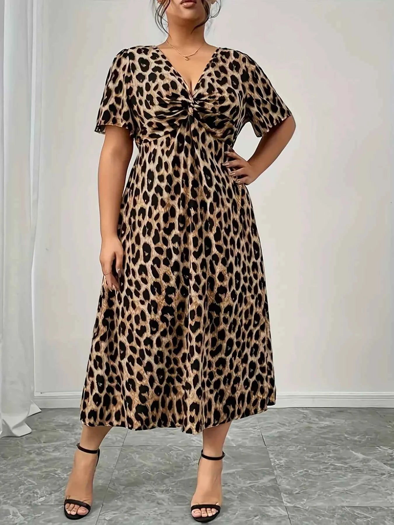 Plus Size Twisted Front Leopard Short Sleeve Dress 2b3be279abf64c7fa6956e8b1a38c6fd-Max-Origin