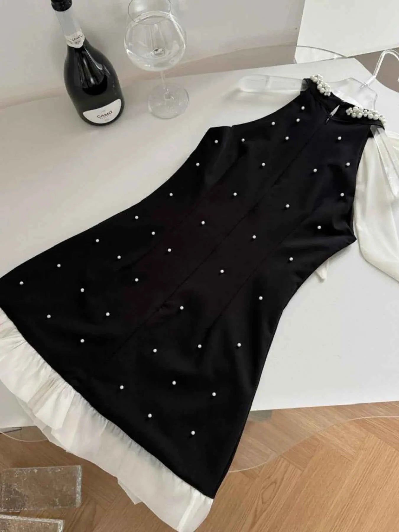 Pearl Detail Sleeveless Mini Dress 2d087250-5aa6-431f-97e1-742983d970a5-Max-Origin