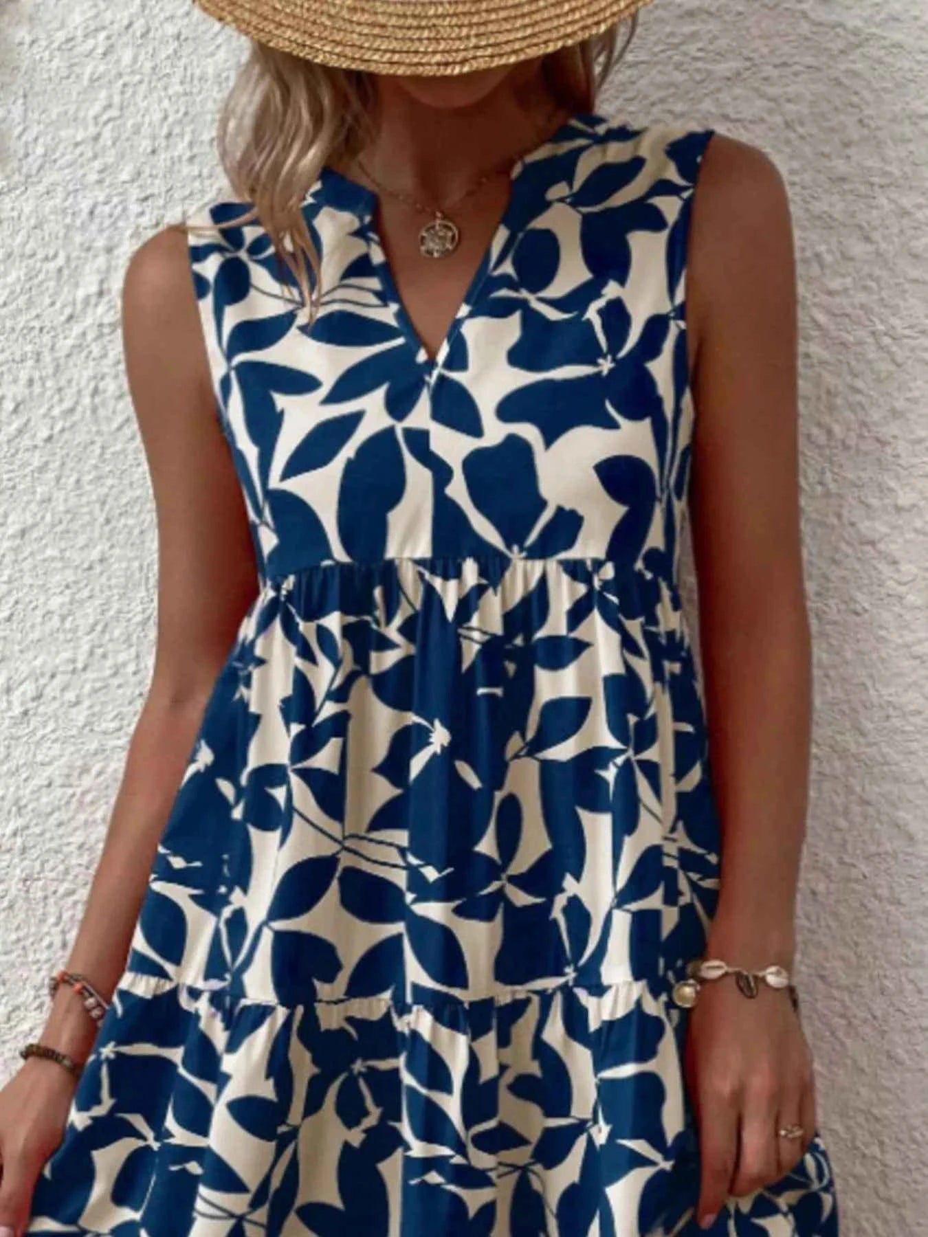 Full Size Printed Notched Sleeveless Mini Dress Plus Size 2d9e4d9c-56b8-4df0-a7a7-989cc30860e7-Max-Origin