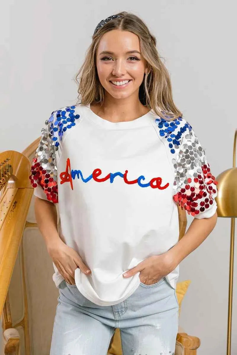 BiBi America Letter Applique Spangle Puff Sleeves Top 2dbf3528fdc6420f8c7d268bca414614-Max-Origin