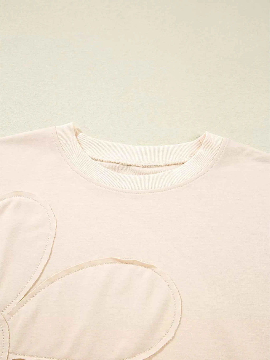 Raw Edge Flower Patch Drop Shoulder Casual Top 33b52f10d82747a9a7f39ee8a7ee4e51-Max-Origin