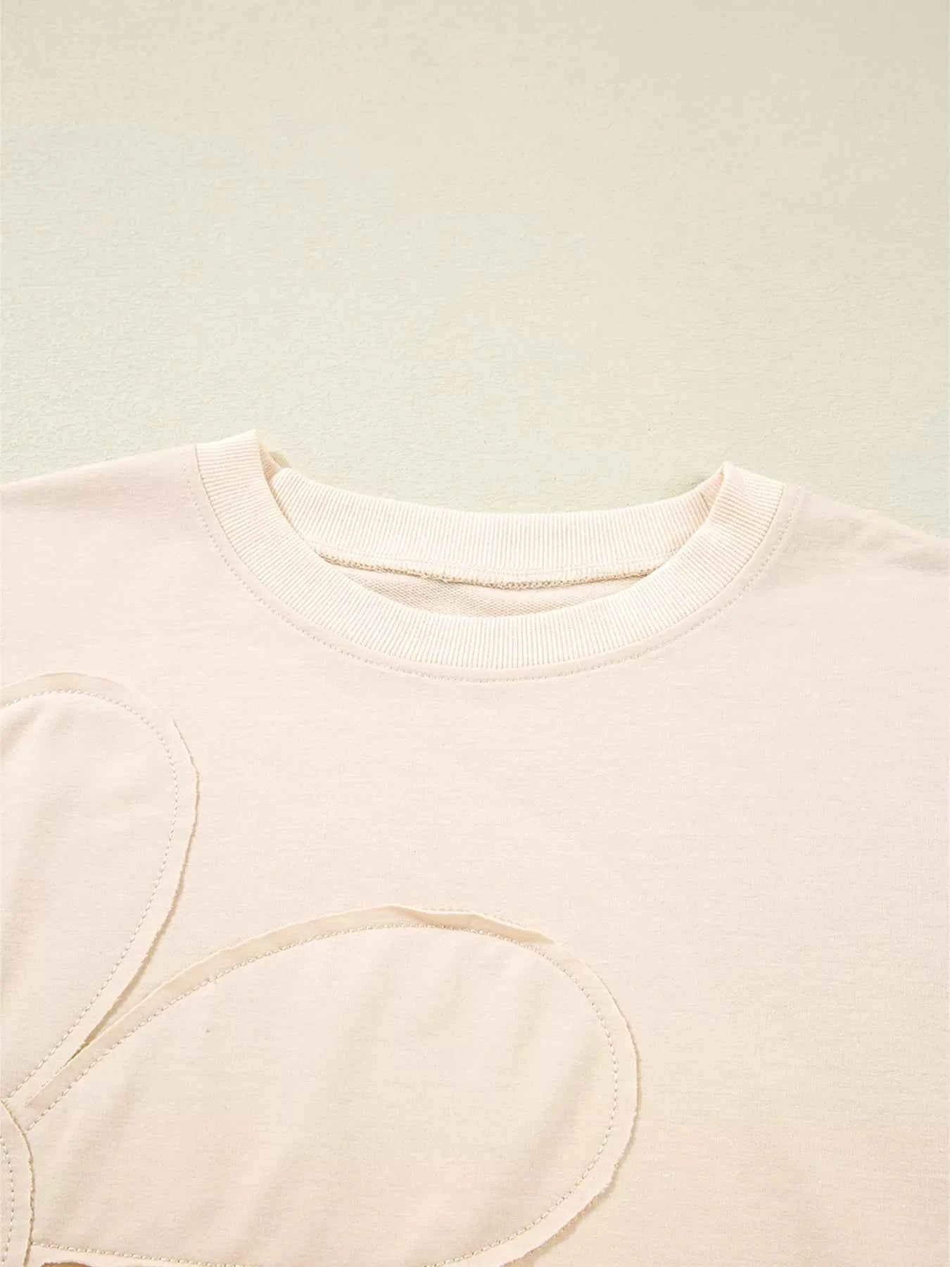 Raw Edge Flower Patch Drop Shoulder Casual Top 33b52f10d82747a9a7f39ee8a7ee4e51-Max-Origin