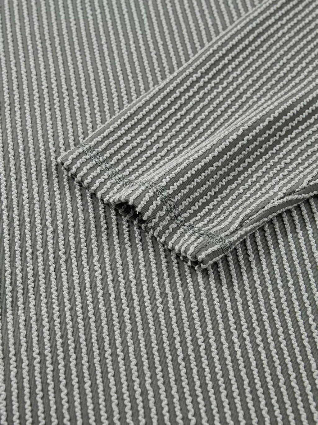 Twist Ribbed Exposed Seam Detail Long Sleeve Loose Top 3f6a12e82ede45528e2760c82c935dad-Max-Origin