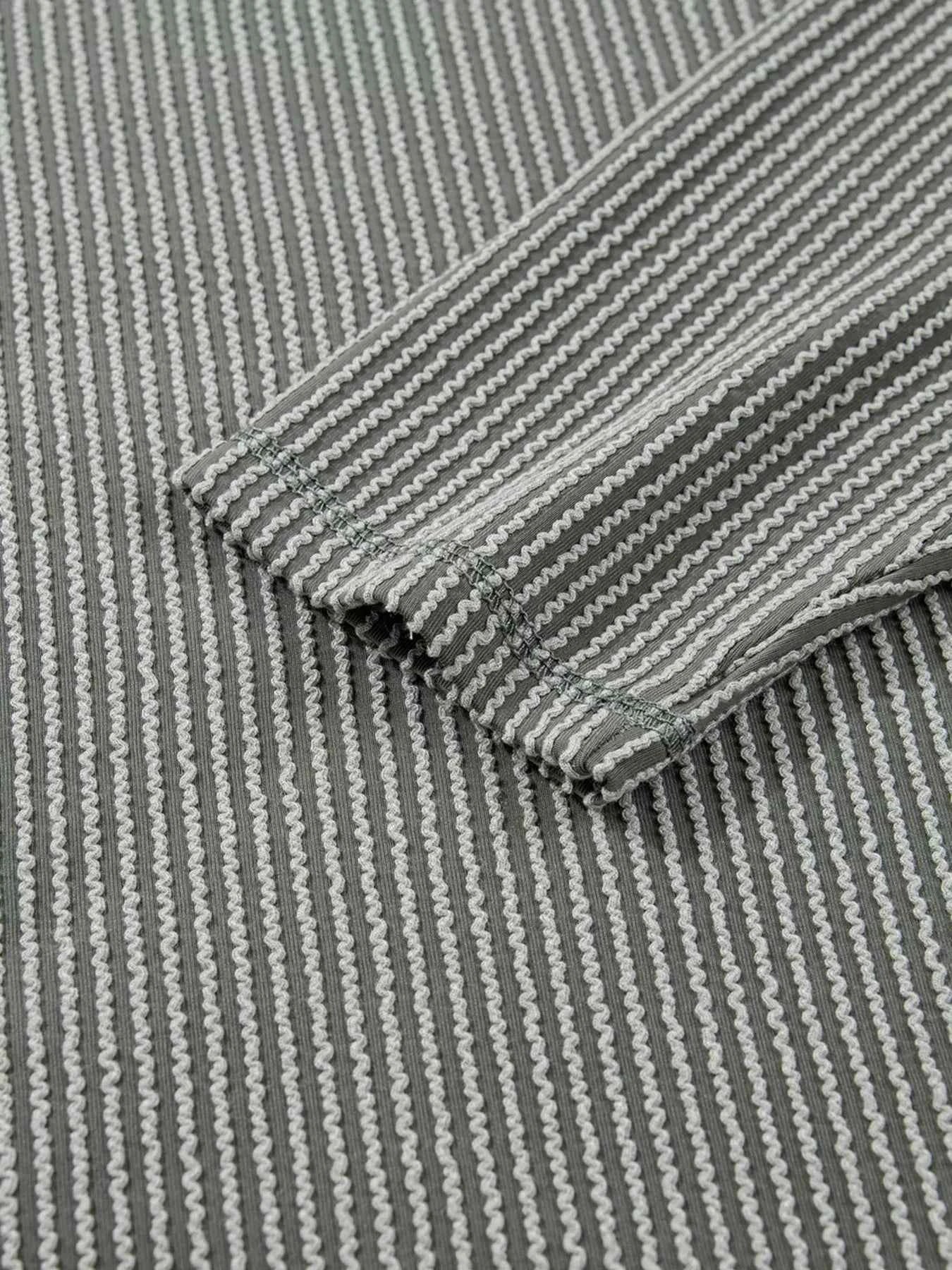 Twist Ribbed Exposed Seam Detail Long Sleeve Loose Top 3f6a12e82ede45528e2760c82c935dad-Max-Origin