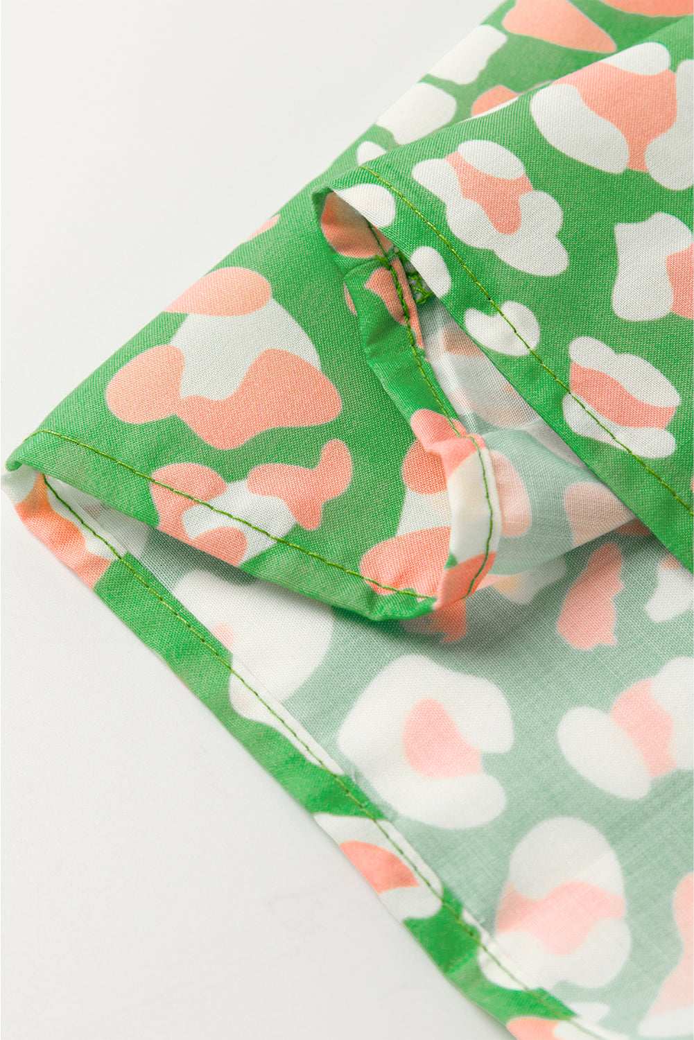 Green Abstract Leopard Tie Front Flutter Sleeve Blouse 406817d032c26514-_8