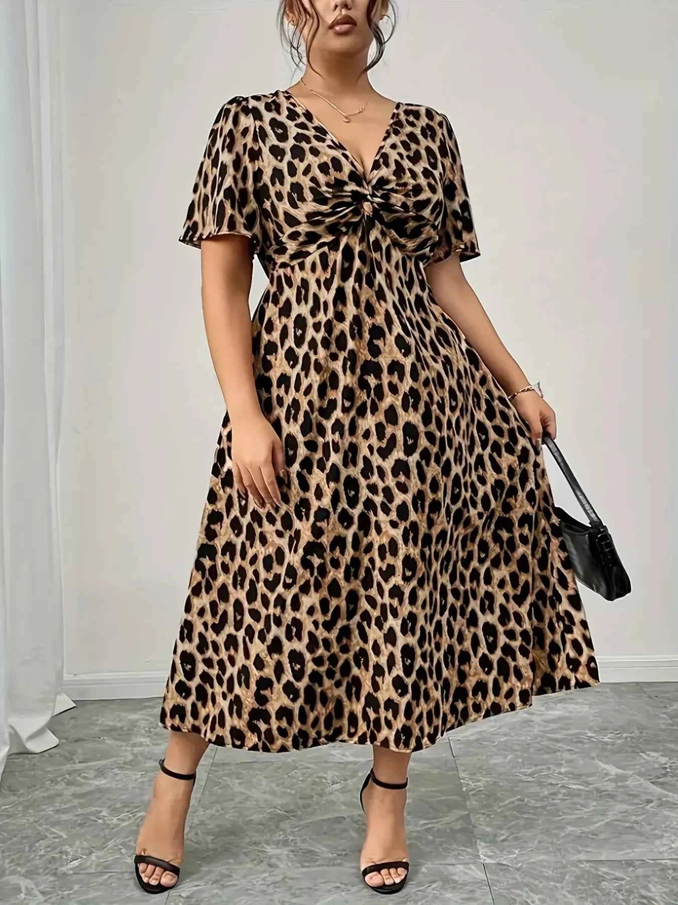 Plus Size Twisted Front Leopard Short Sleeve Dress 47dda7368fed43849cd85cf5a9fd774b-Max-Origin