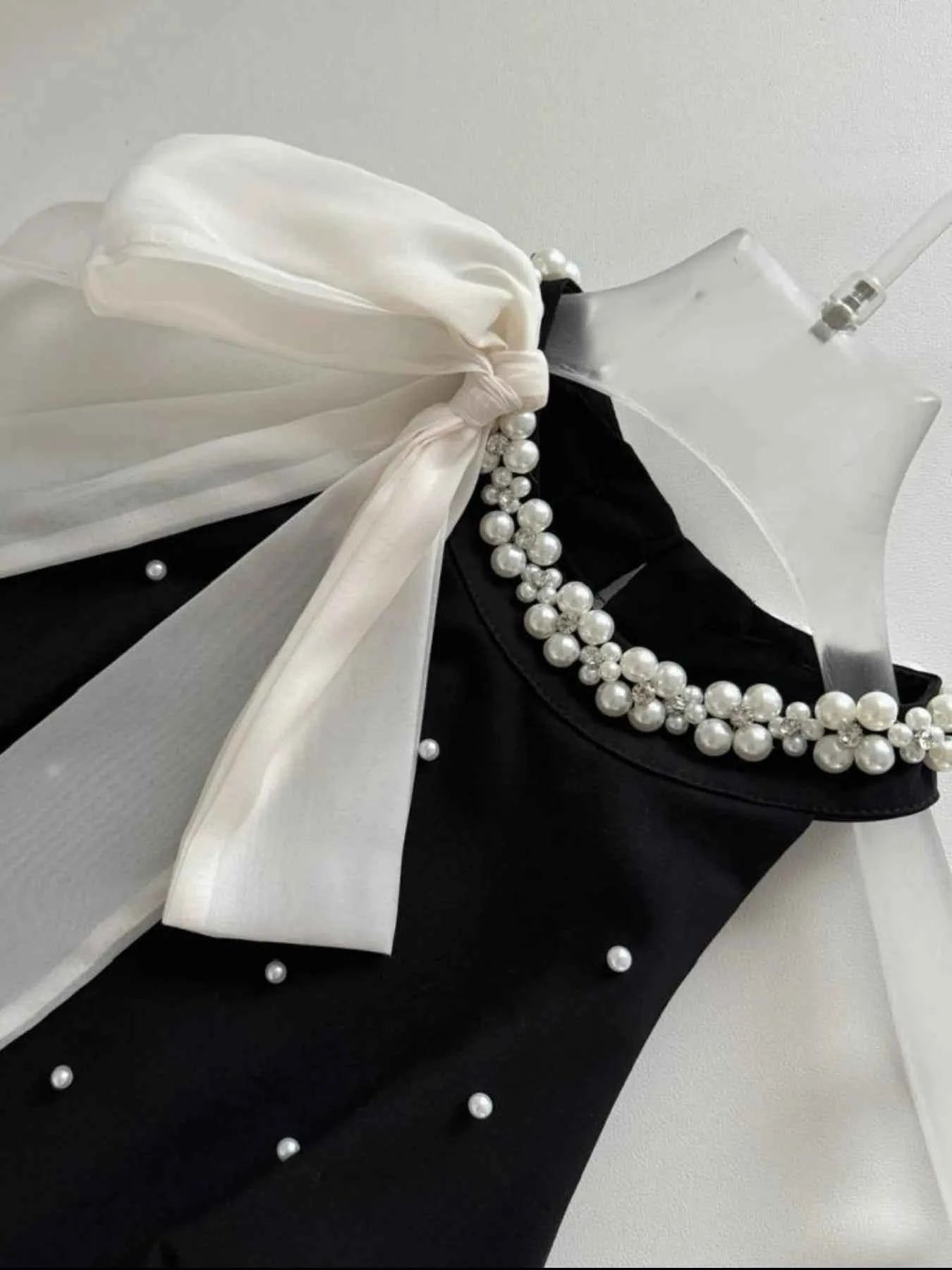 Pearl Detail Sleeveless Mini Dress 49f98d6a-1ef6-4106-93e1-36084a36850f-Max-Origin