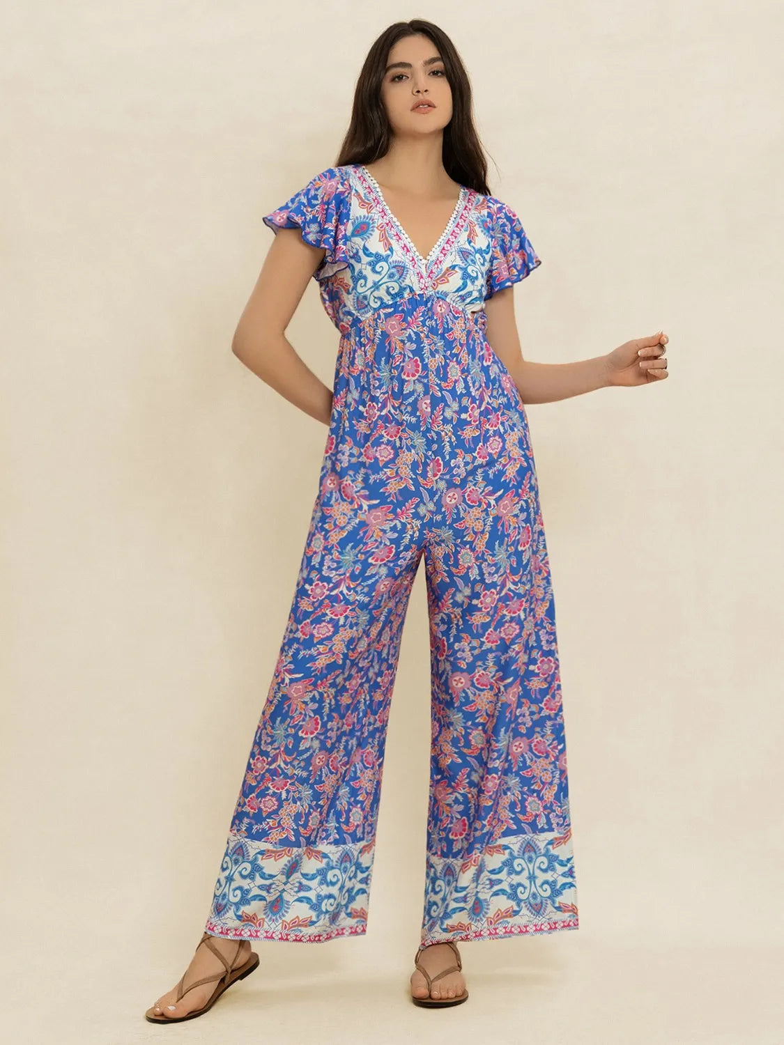Printed V-Neck Wide Leg Jumpsuit 4b95eb9c-ab7a-4bf4-9c2c-a5bffa339faa-Max-Origin
