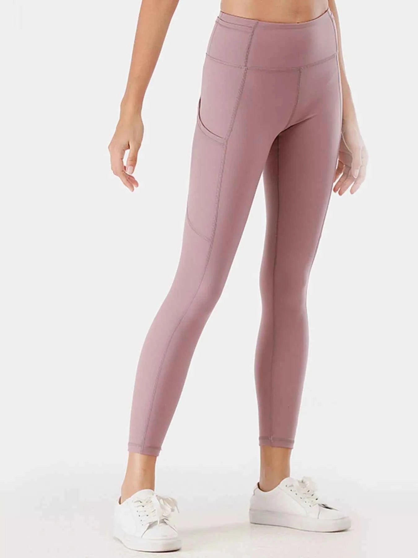Full Size High-Waisted Active Leggings with Pockets Plus Size 51fee45667194b399b65ce375fc95bd4-Max-Origin
