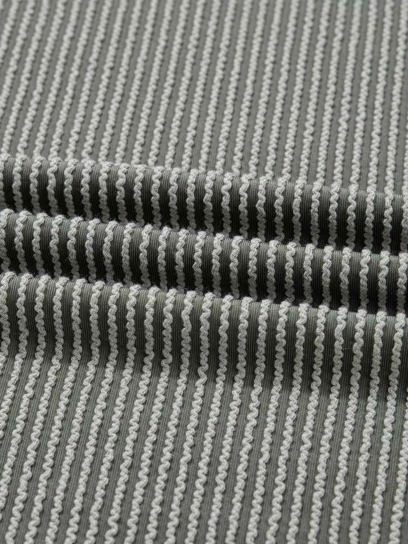 Twist Ribbed Exposed Seam Detail Long Sleeve Loose Top 539b6a3e64344909944dee188a907752-Max-Origin