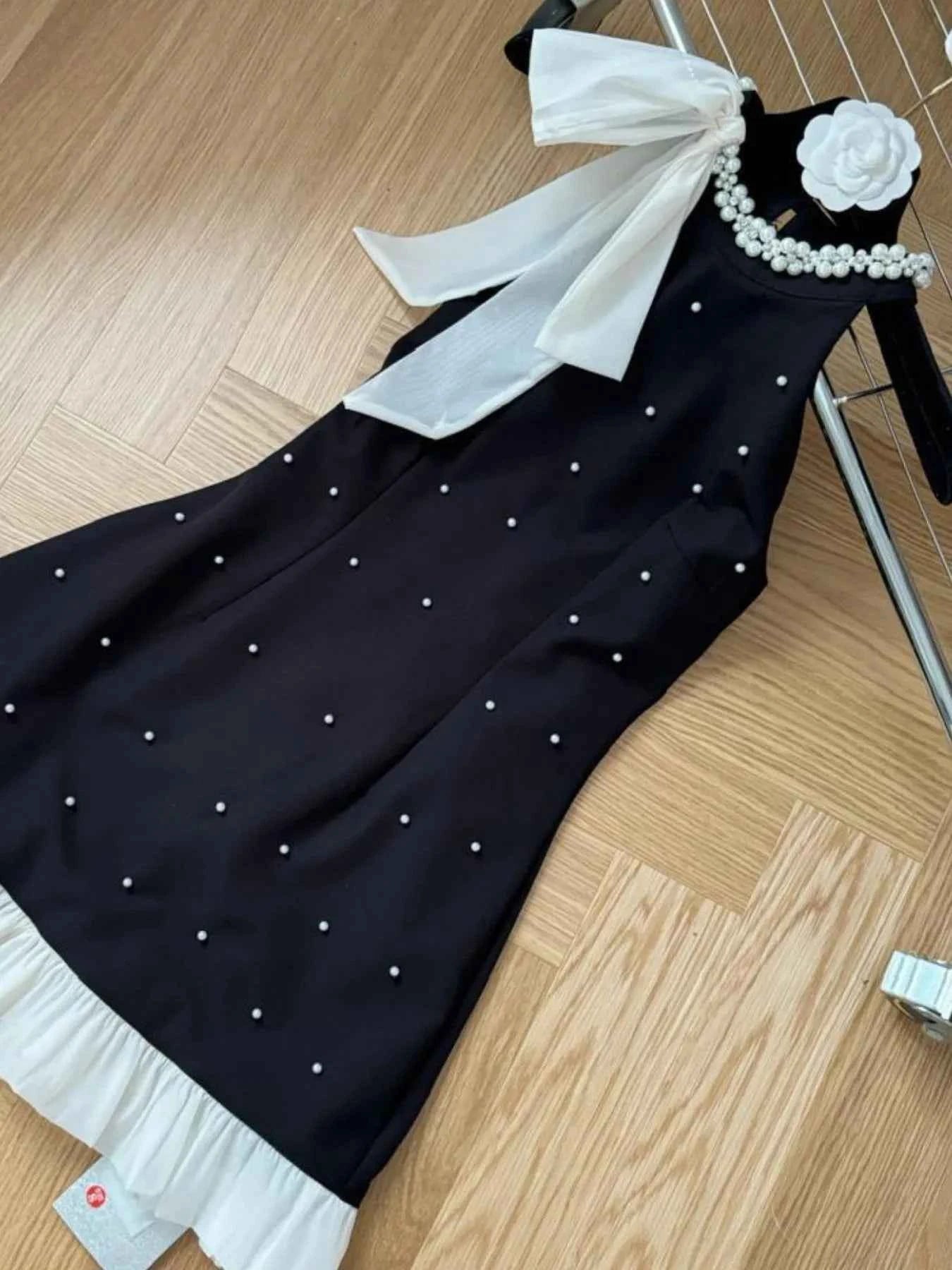 Pearl Detail Sleeveless Mini Dress 5401381b-9af4-448a-bca1-7e0c9c6d8d34-Max-Origin