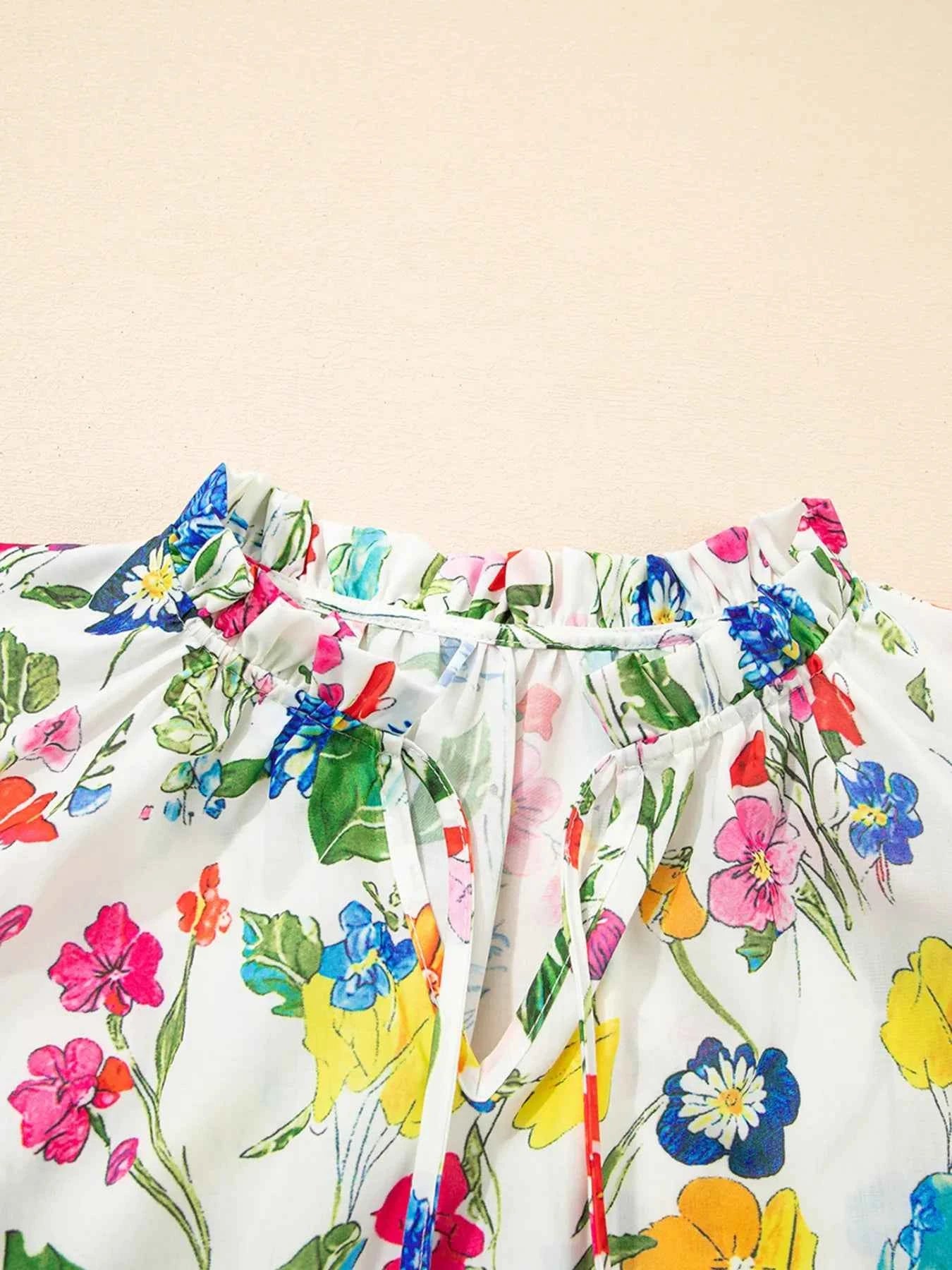 Floral Print Ruffle Layered Short Sleeve Blouse 556f889b60f7406cbea8dad0249e9122-Max-Origin