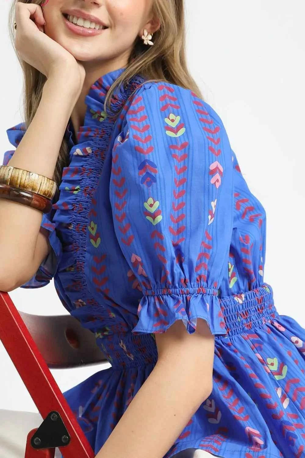 Umgee Printed Half Sleeve Peplum Blouse 5a68fff2-97cb-40ee-b92e-004db3c45112-Max-Origin
