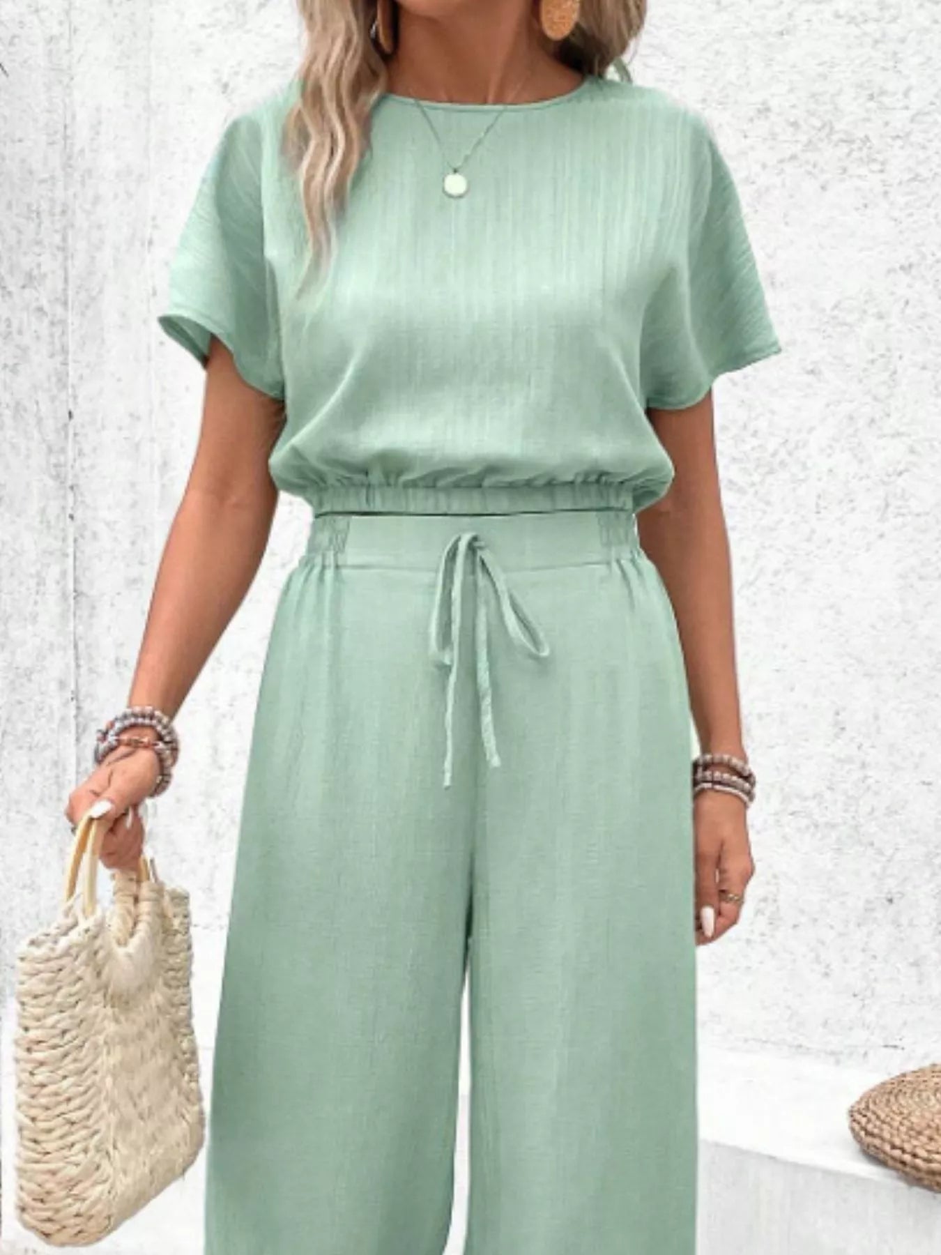 Round Neck Short Sleeve Top and Pants Set 5a8ee825-ba73-4e53-867c-519cc78fbc82-Max-Origin