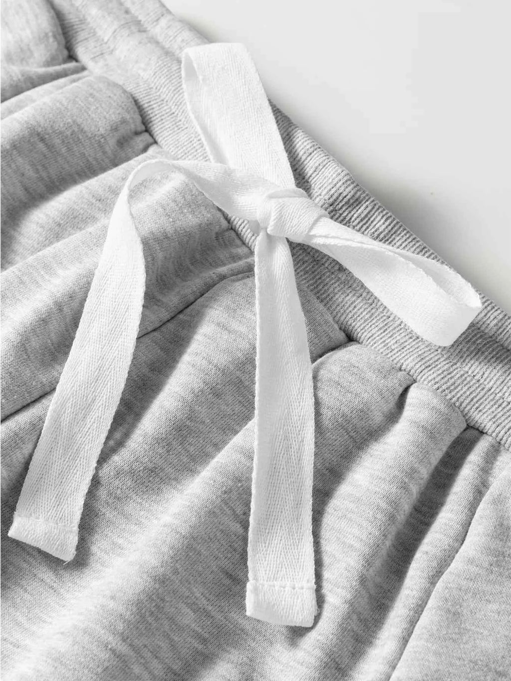 Lace Patchwork Drop Shoulder Top and Drawstring Skort 2pcs Outfit 64c2e8e7c9ba4573914e5ce5320b300d-Max-Origin