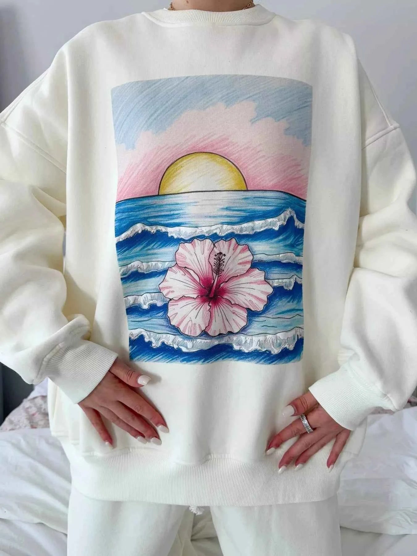 Graphic Round Neck Drop Shoulder Sweatshirt 7612cdd22008481c99e7fa71a78a39f7-Max-Origin