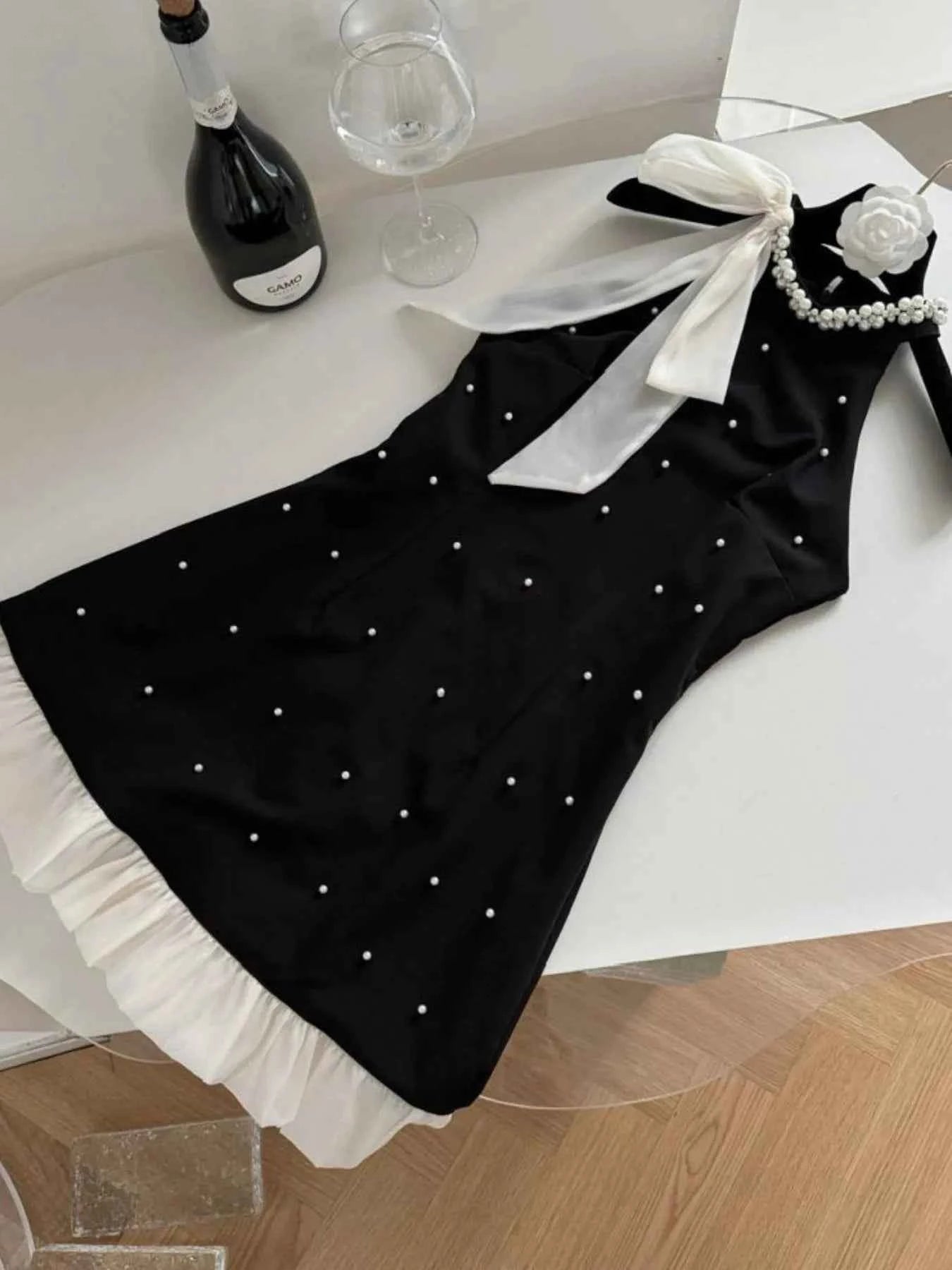 Pearl Detail Sleeveless Mini Dress 7683f1a1-fe98-490d-9fca-abdd9e2ff2f9-Max-Origin