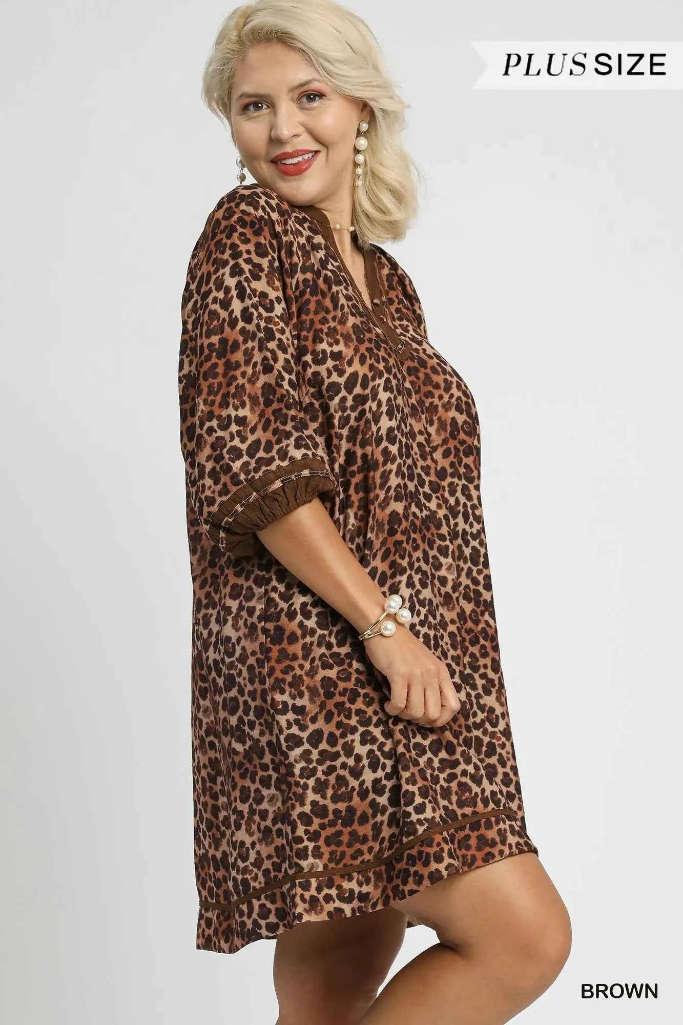Umgee Full Size Leopard Print Mini Dress with Contrast Trim Plus Size 768ab9bd-f00f-406f-a373-315593d84167-Max-Origin