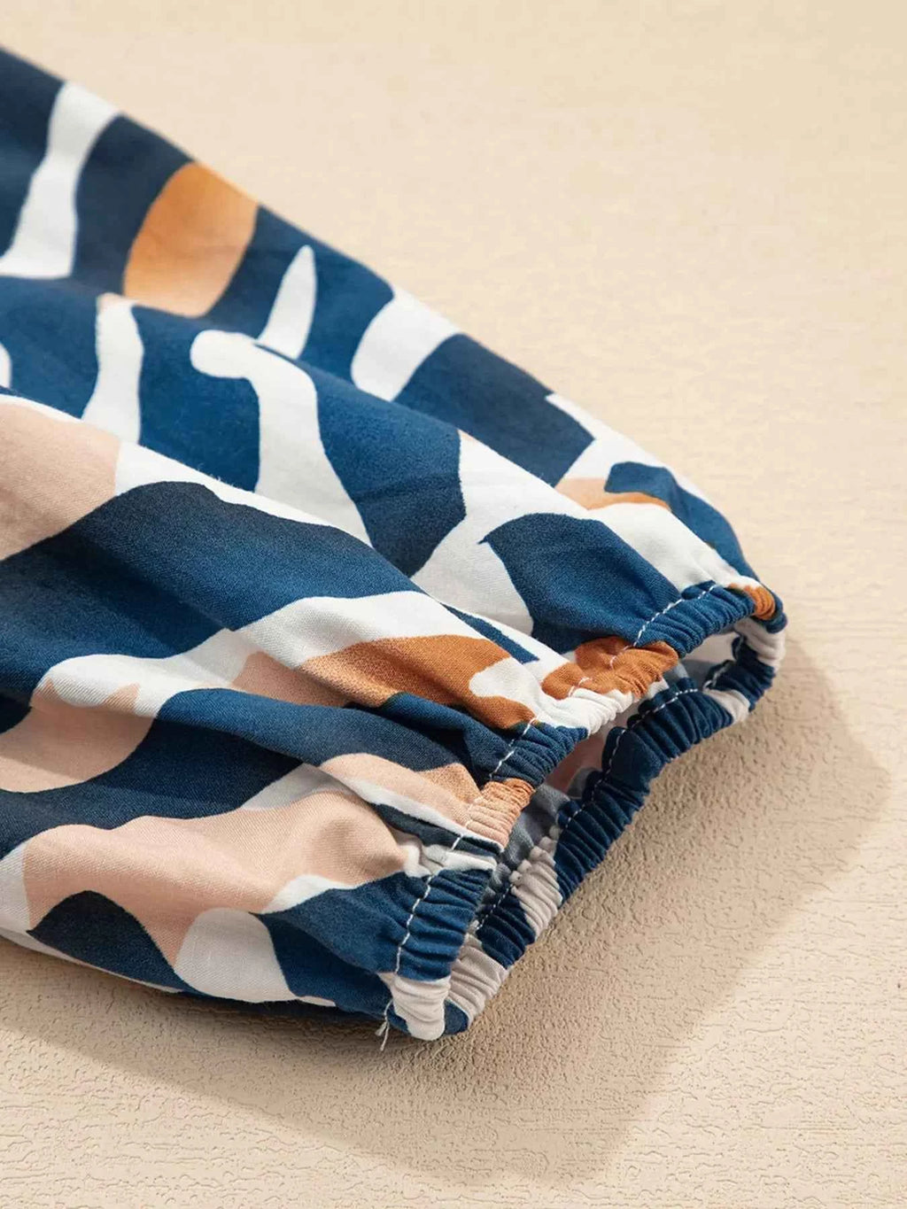 Zebra Print Tied Front Puff Sleeve Top 7cb971b4983643ba96862c3b3ac4a94c-Max-Origin