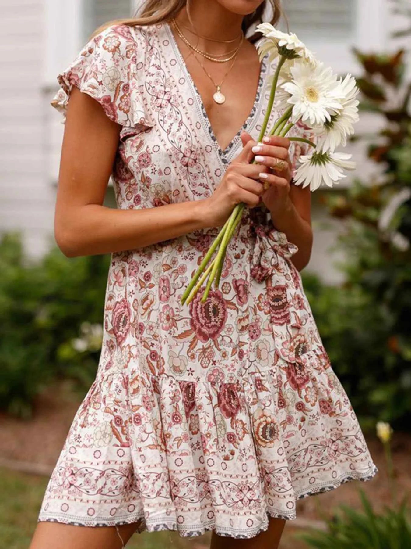 Surplice Flutter Sleeve Mini Dress 884d774914b245439bb3ae115100959c-Max-Origin