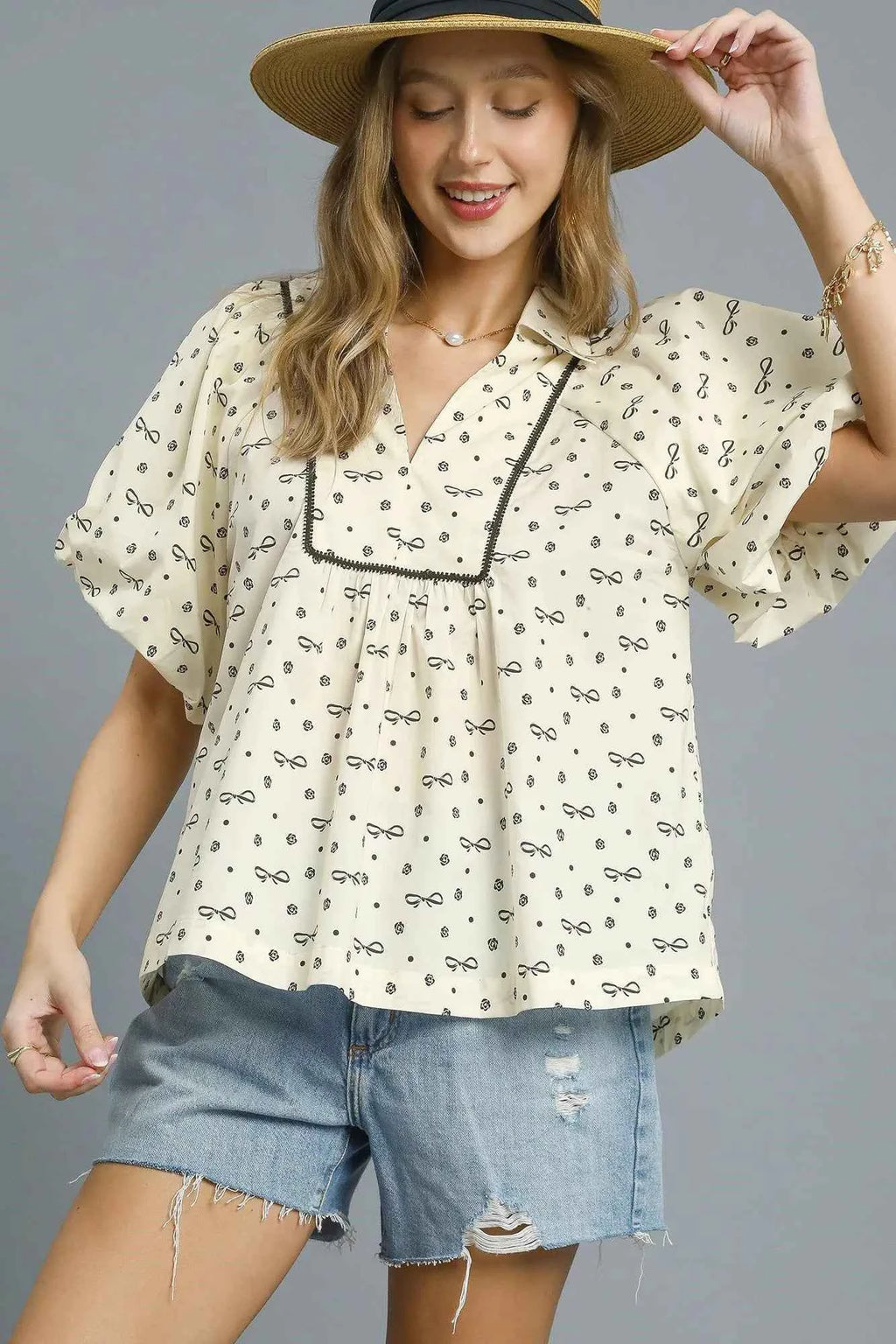 Umgee Bow Print Puff Sleeve Blouse 88e0dc8d-6769-4f98-a097-c99dd9ec95a3-Max-Origin