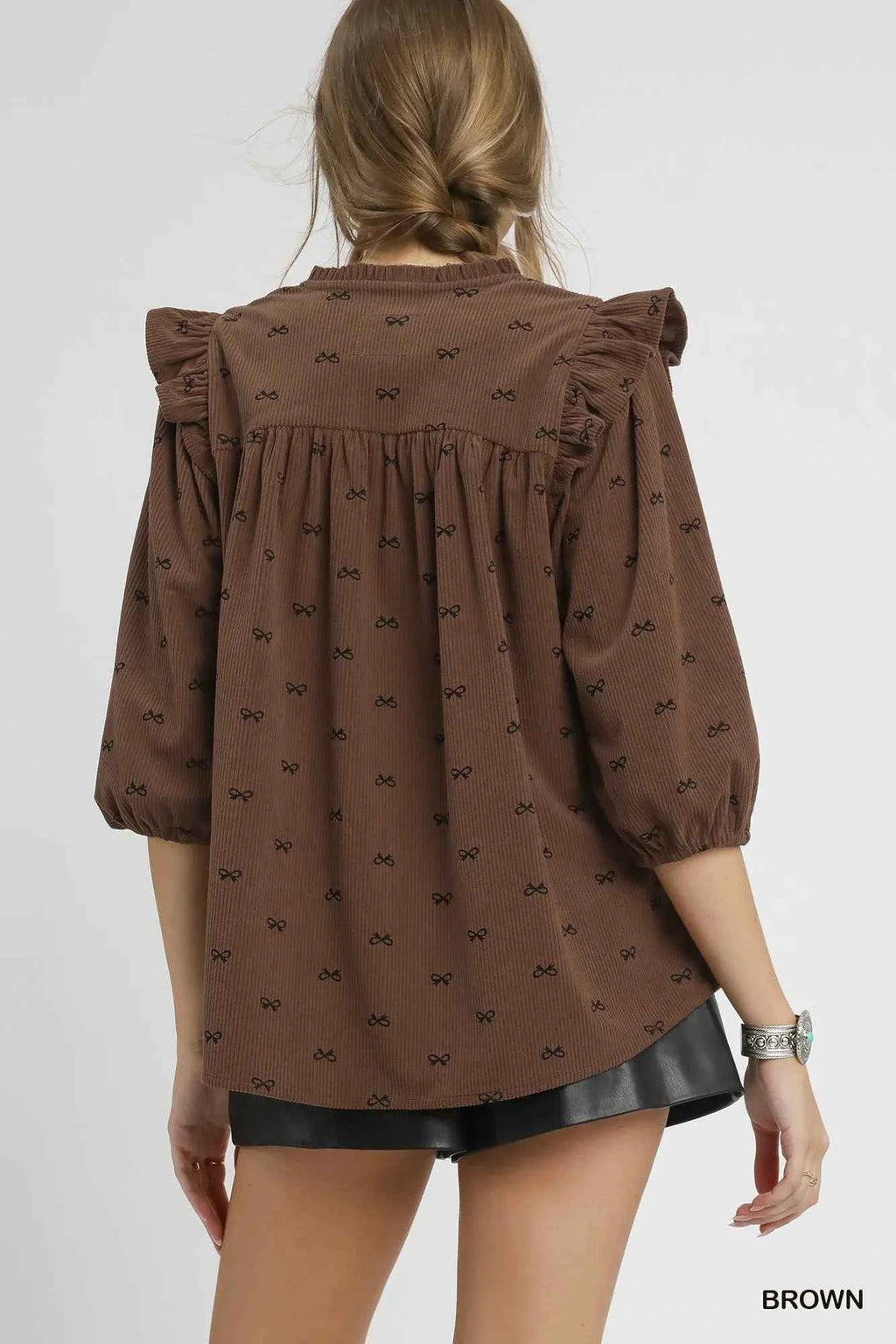 Umgee Bow Print Corduroy Puff Sleeve Blouse with Ruffled 8beb9eca-2ff1-426a-a1e0-869ddeac15a4-Max-Origin