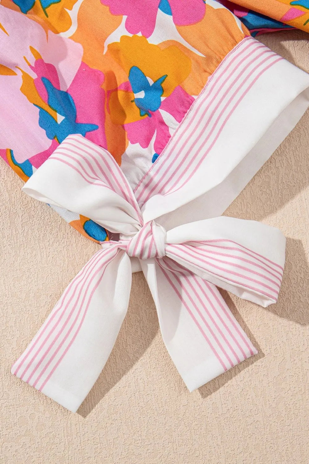 Floral Striped Edge V Neck Knotted Short Sleeve Blouse 8f39bf6d-74f9-4b22-b21d-8261765dbb1f-Max-Origin