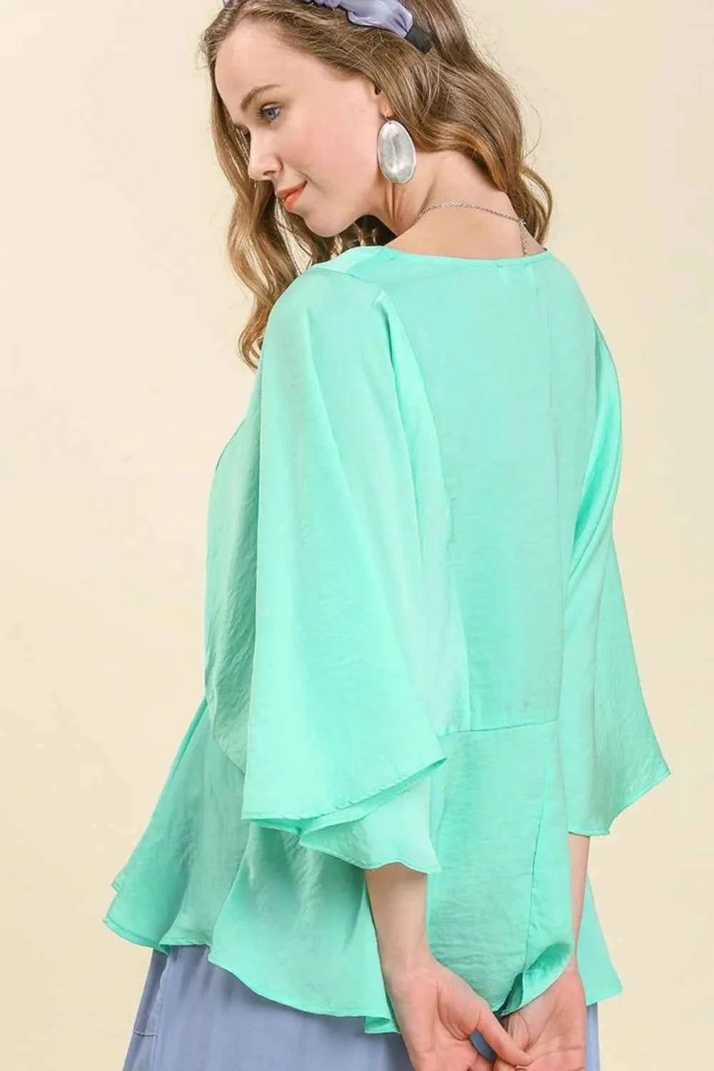 Umgee Full Size Satin Pleated Peplum Round Neck Blouse Plus Size 8fb5b84d-2d25-4ffd-9475-d6dd5b8c90bb-Max